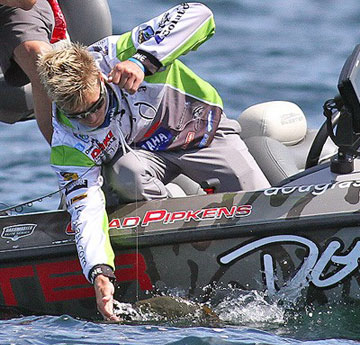 Chad Pipkens lands a smallmouth bass during the final of the 2013 St. Lawrence River Showdown. Photo credit: B.A.S.S./Steve Bowman