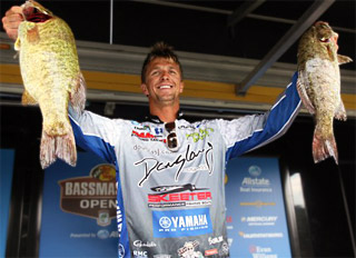 Chad Pipkens with 2 big Lake Erie smallmouth bass on stage at the Bassmaster Northern Open on his way to victory. Credit: James Overstreet