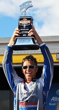 Chad Pipkens hoist his Bassmaster Lake St. Clair trophy knowing he's also earned a spot in the 2015 Bassmaster Classic. Credit: James Overstreet