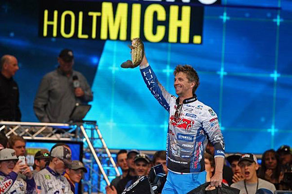 Pip hoists a solid Grand Lake bass during the 2016 Bassmaster Classic weigh in at the BOK Center in Tulsa Oklahoma!