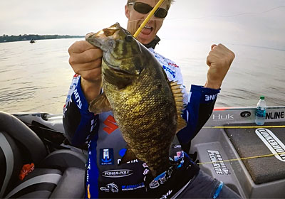 Bassmaster Elite Angler Chad Pipkens celebrates another great Oneida Lake smallmouth bass on the way to his Northern Open Top Ten finish!