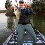 Chad Pipkens with a Chickamauga Lake bass during the 2022 Bassmaster Elite Series event.