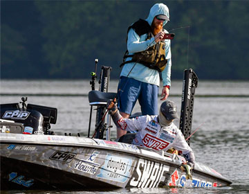 Chad Pipkens boats a Pickwick Lake bass during the 2022 Bassmaster Elite Series tournament.